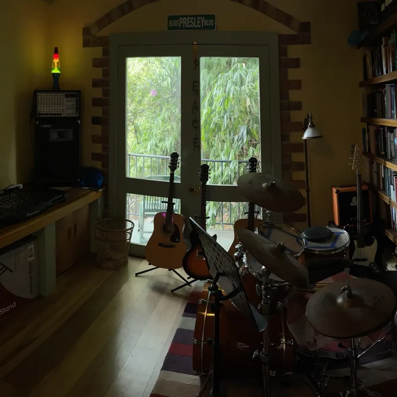 Guitars and drum kit inside the studio
